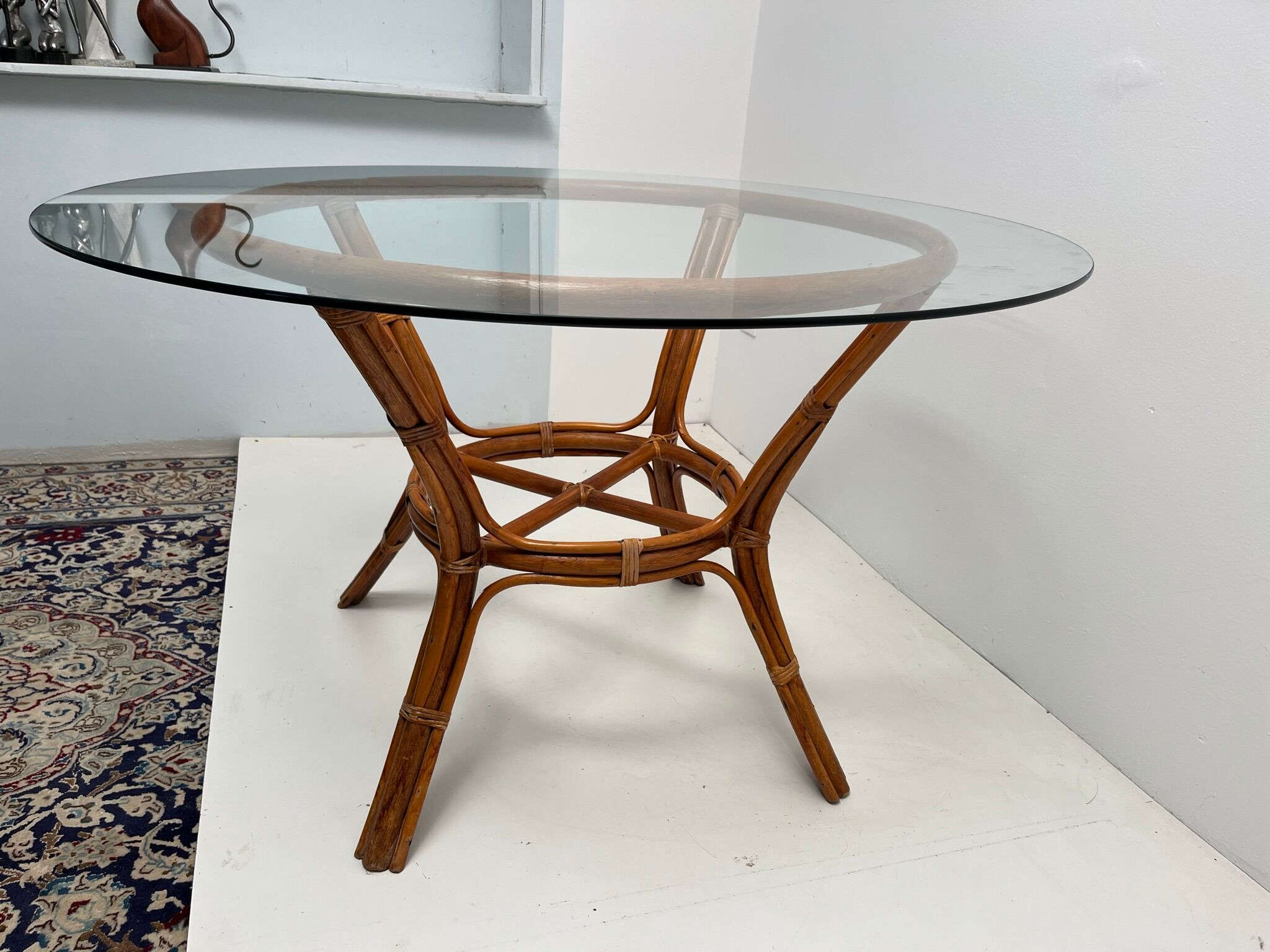 Vintage glass top rattan dining table