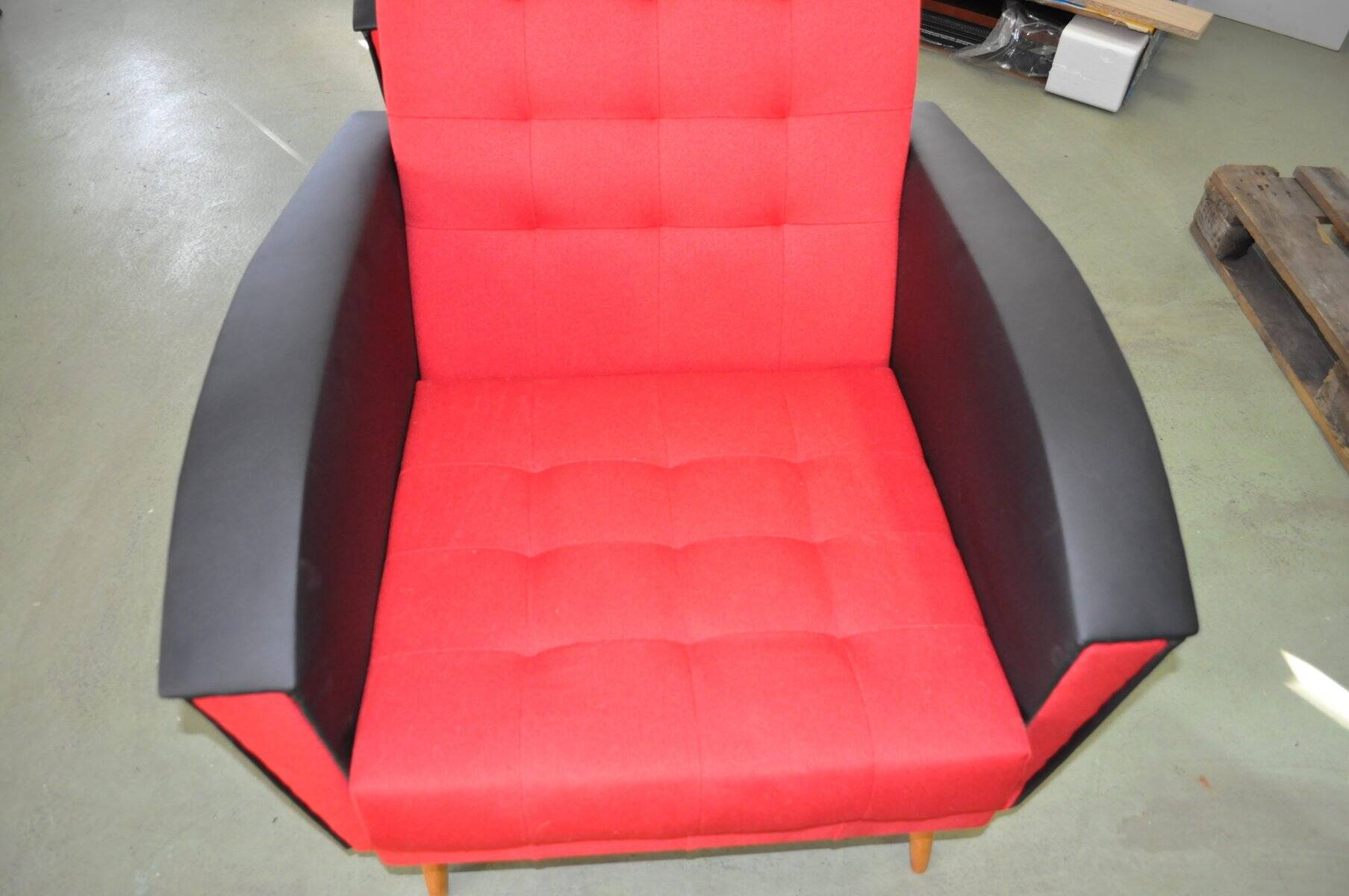 Pair of vintage red fabric armchairs with light wood legs from the 1960s.
