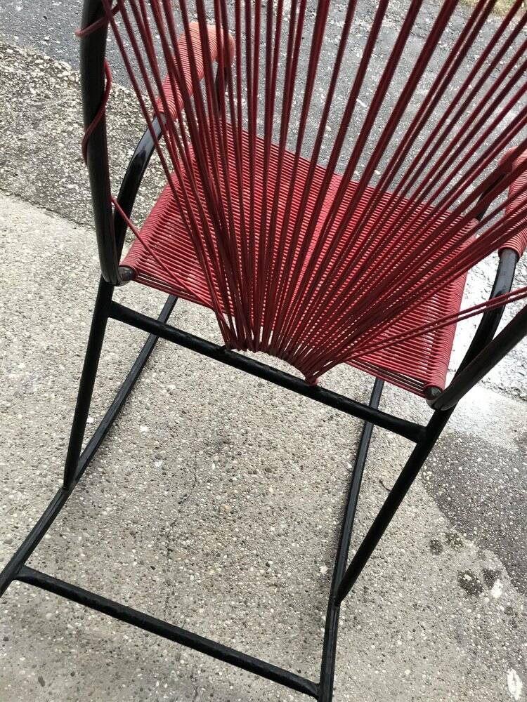 Vintage red metal rocking chair, graphic plastic cord with fan backrest, 1960s.