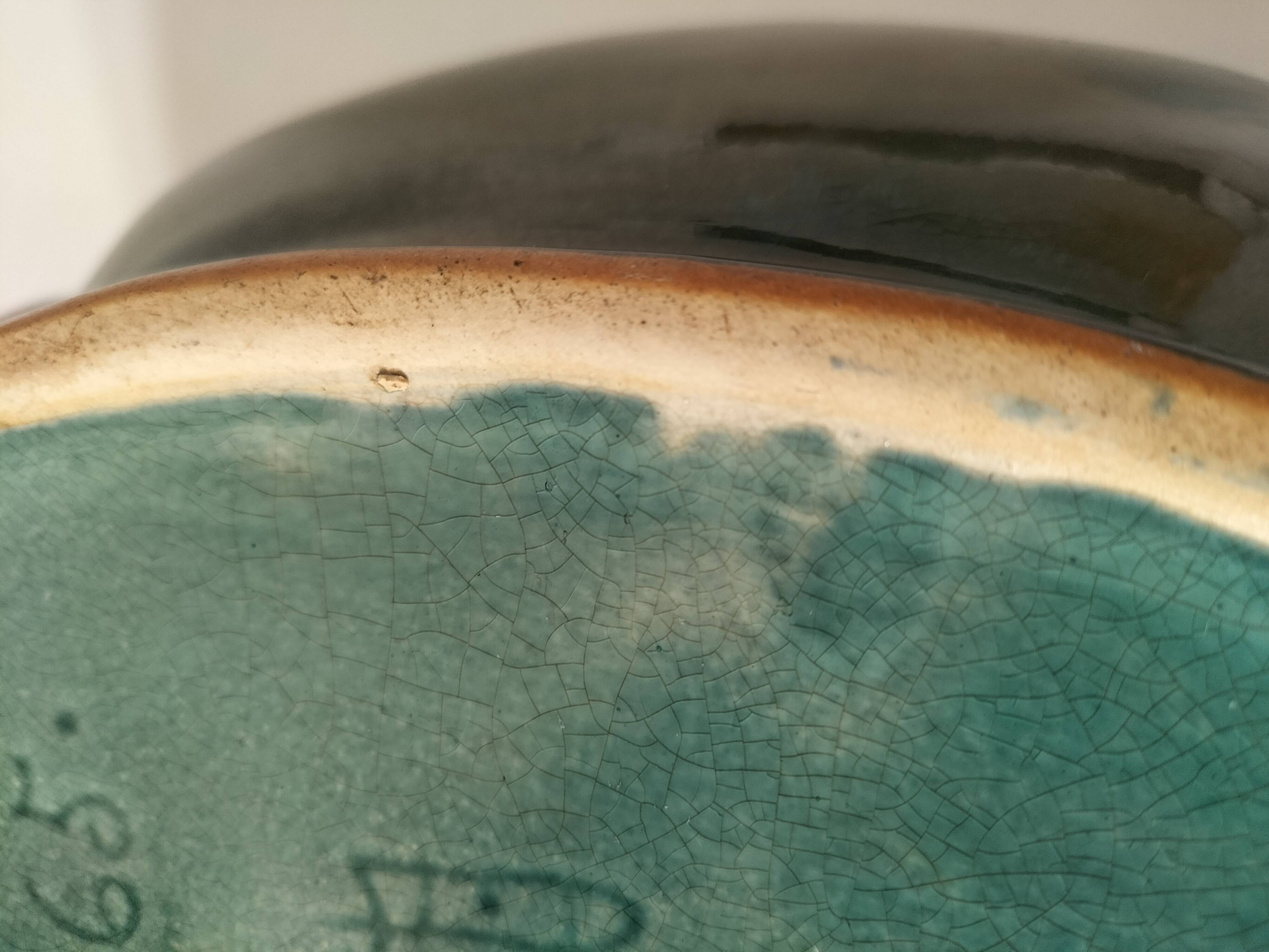 Art Deco flared cache-pot in turquoise glazed earthenware.