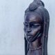 Large wooden bust of an African woman.