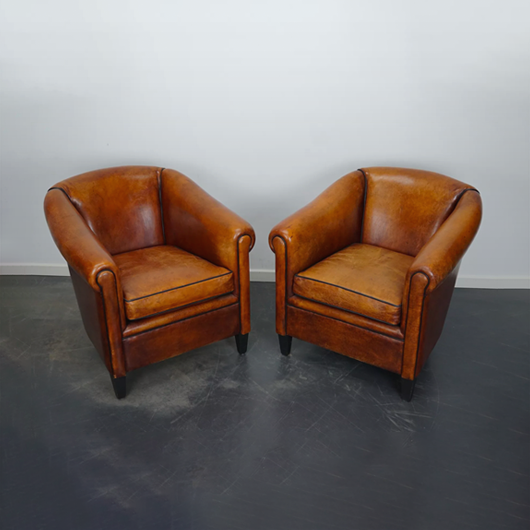 Pairs of club chairs