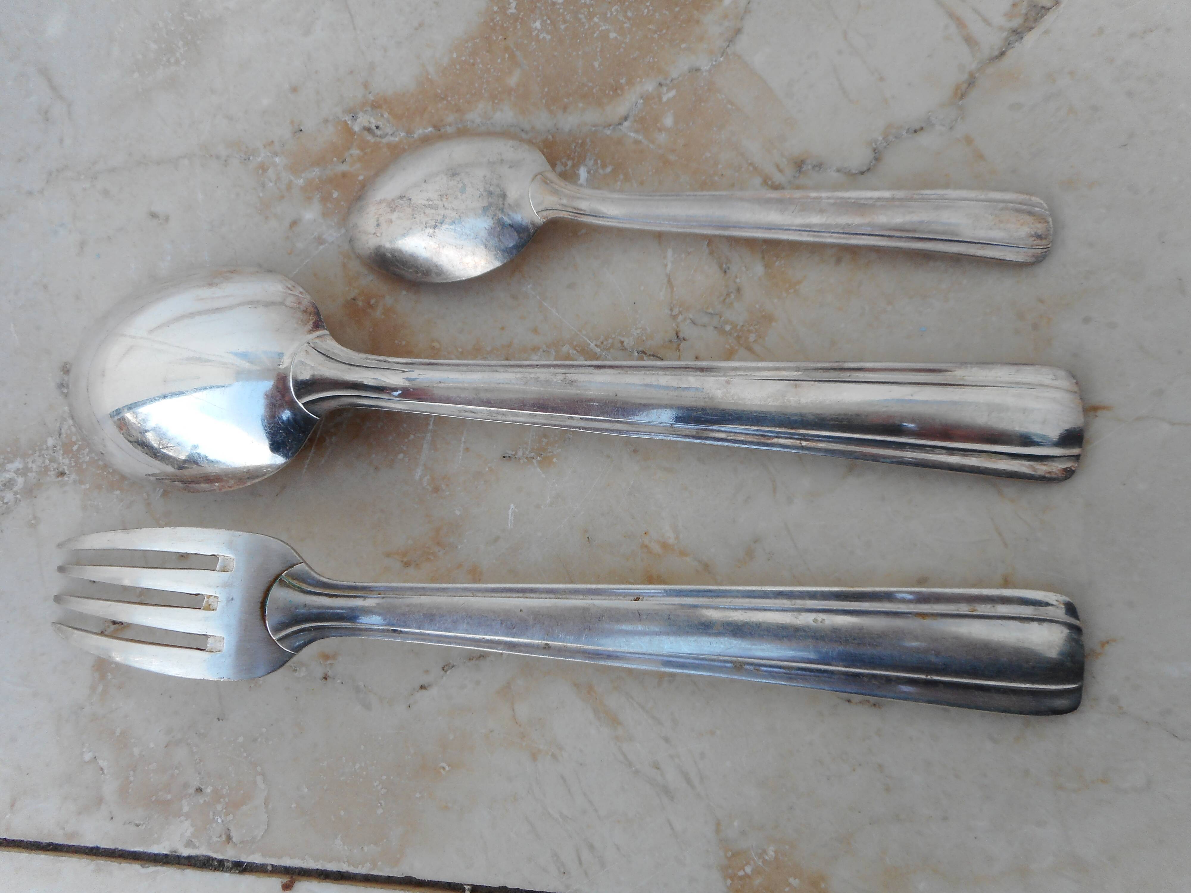 Box with silver metal housewife