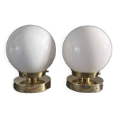 Pair of white opaline globe wall lights
