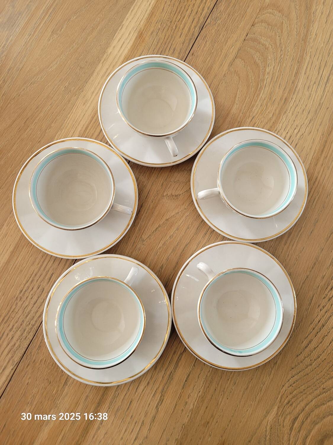 5 antique cups and saucers
