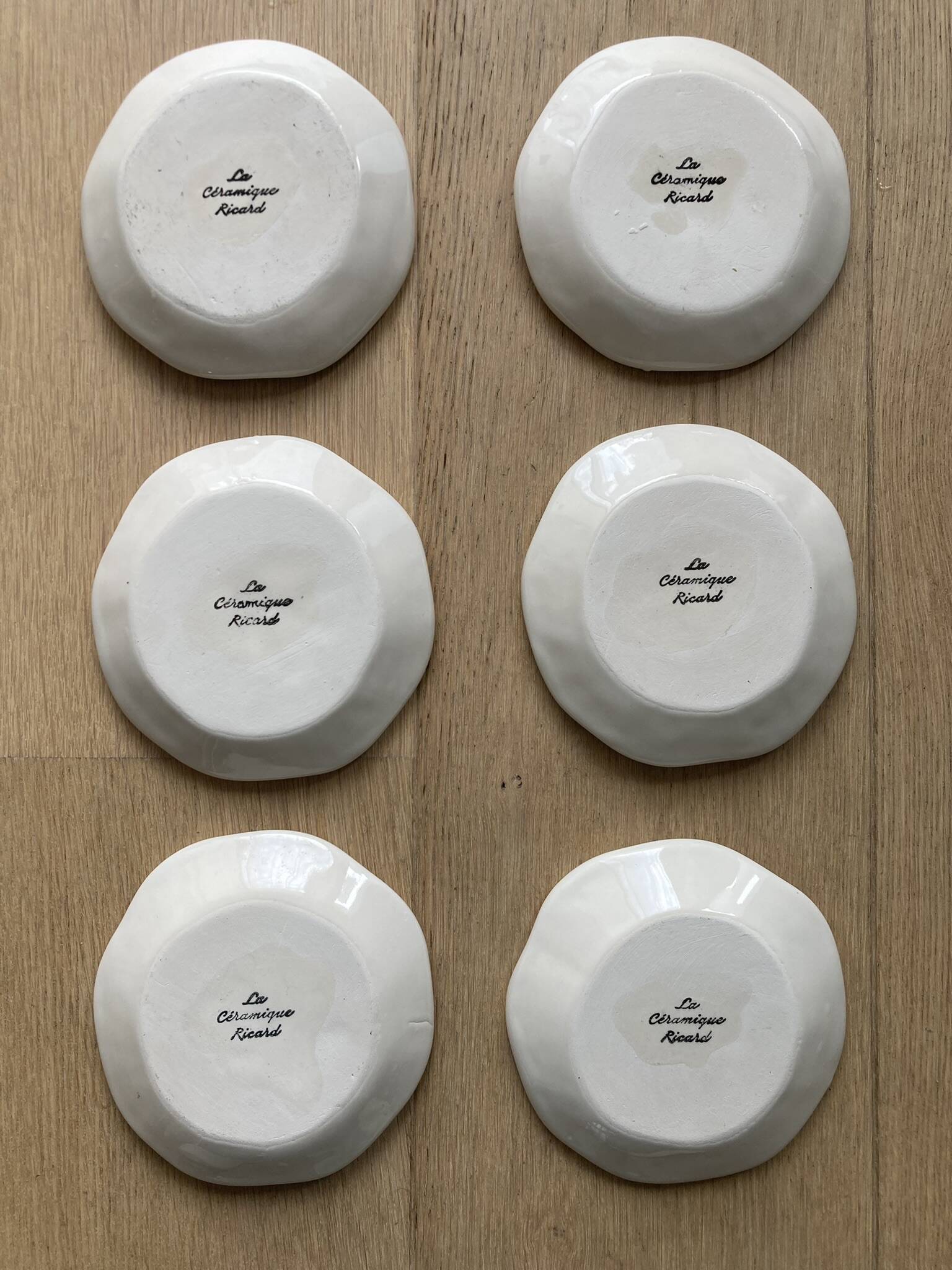 6 small ceramic plates