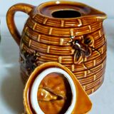 Set of old teapots and honey pot