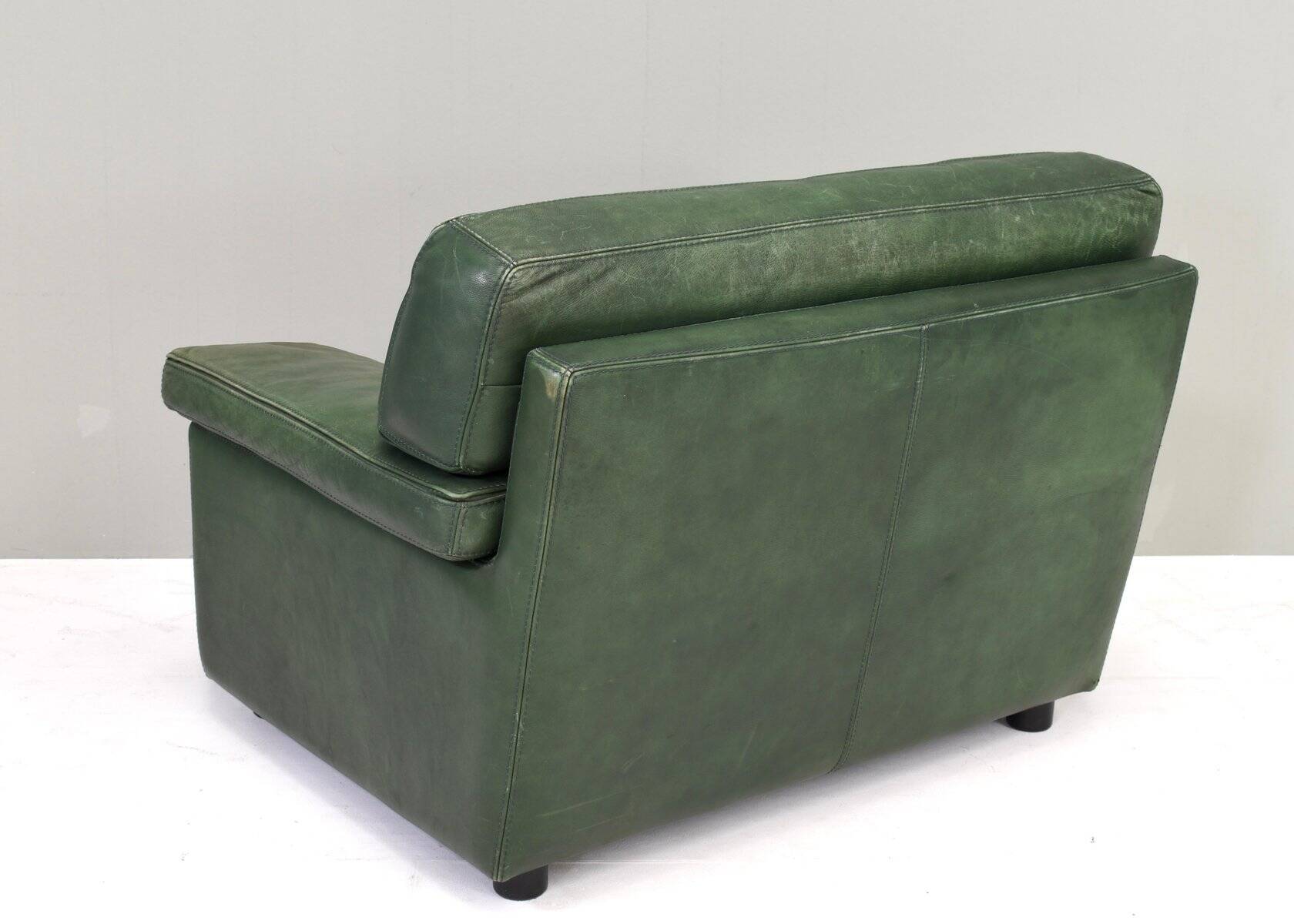 Roche Bobois lounge armchair in original green patinated leather, 1970