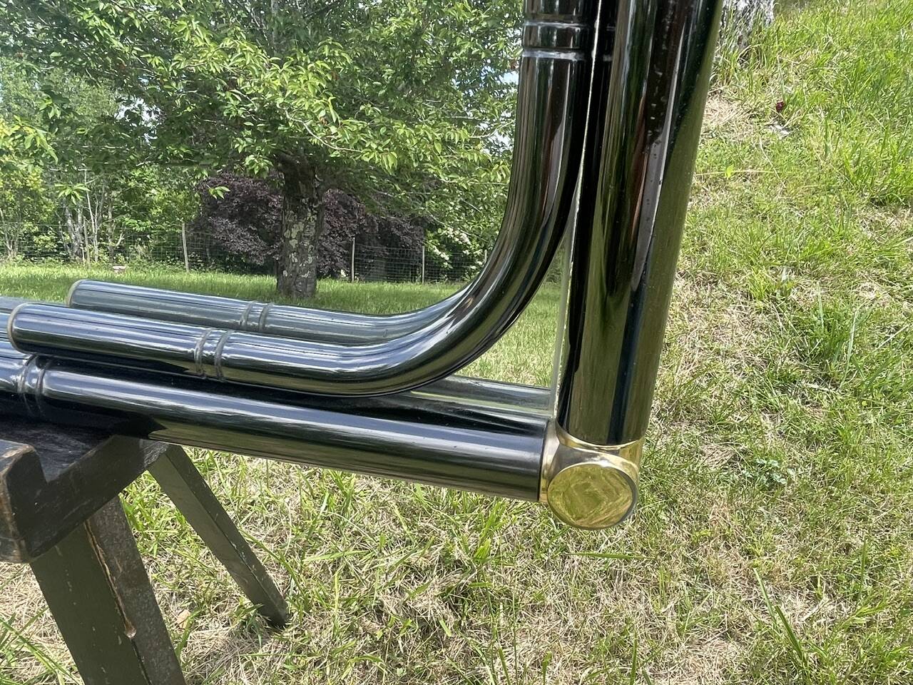 Vintage rectangular wall mirror in tubular metal and brass, 1970s/1980s.