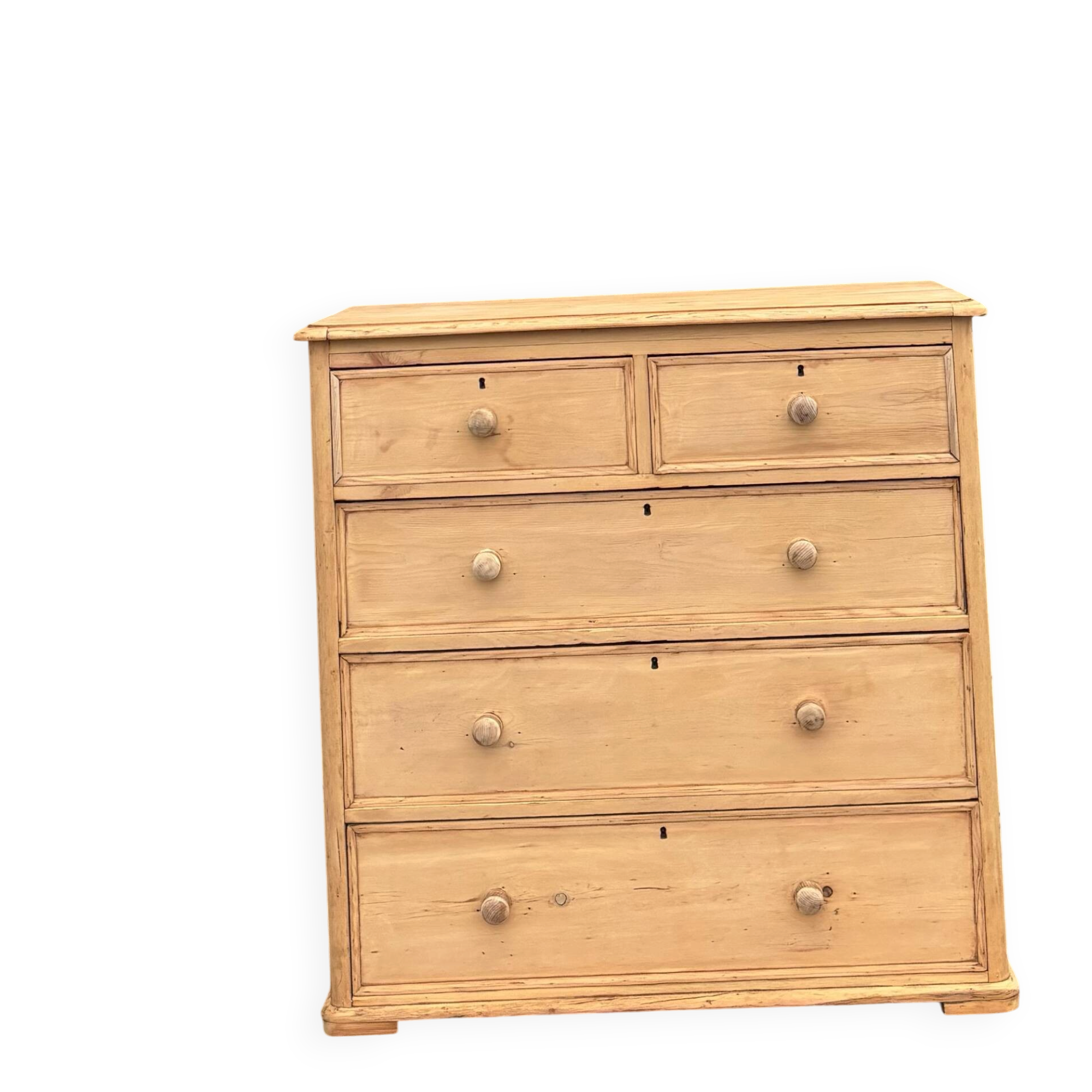 Large antique English chest of drawers in pitch pine.