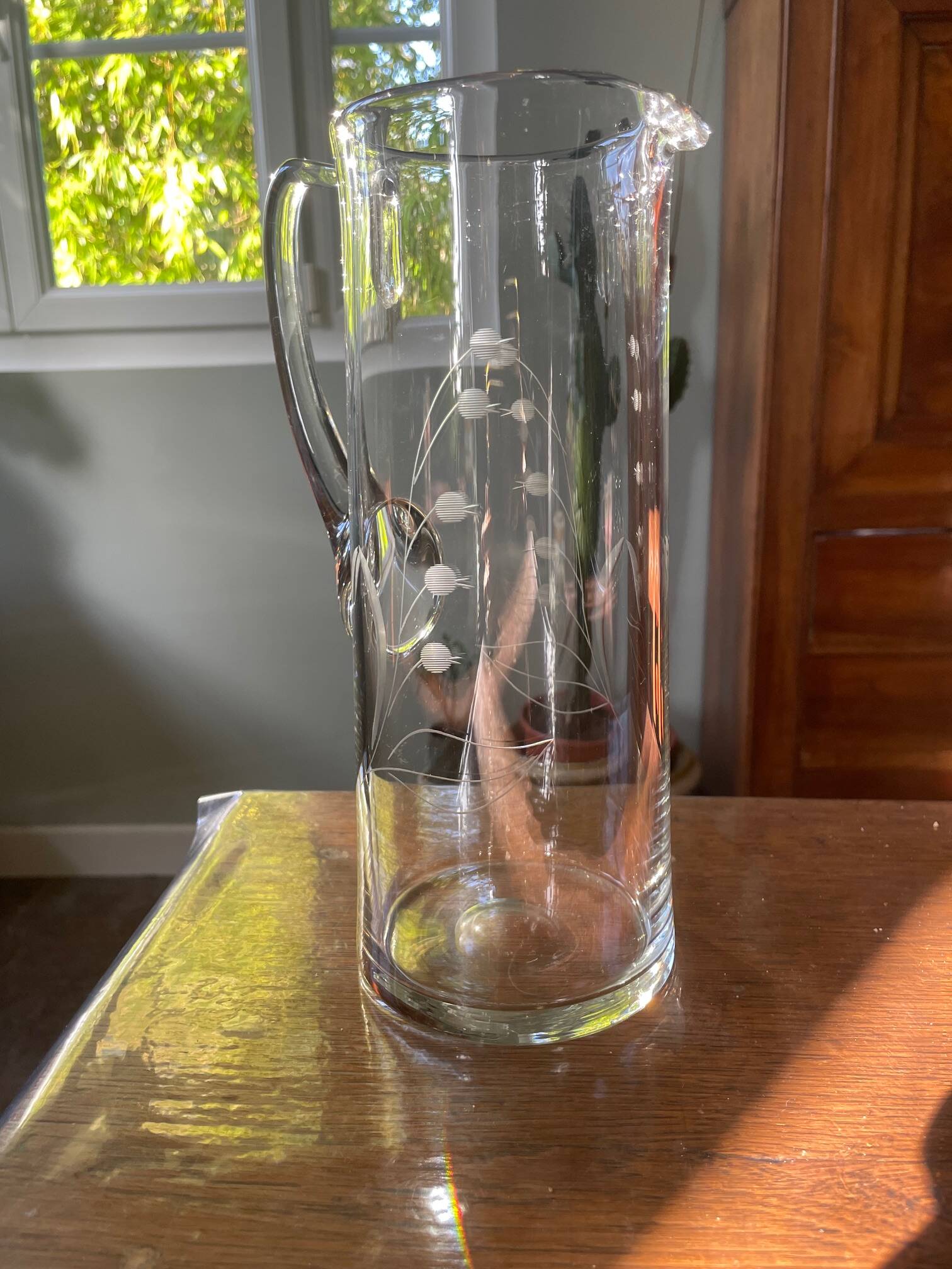 Pitcher or carafe in blown crystal and engraved with floral motif