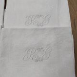White linen towels embroidered