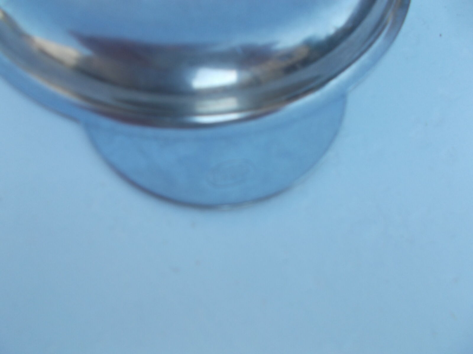 Round earthenware plate in stainless steel