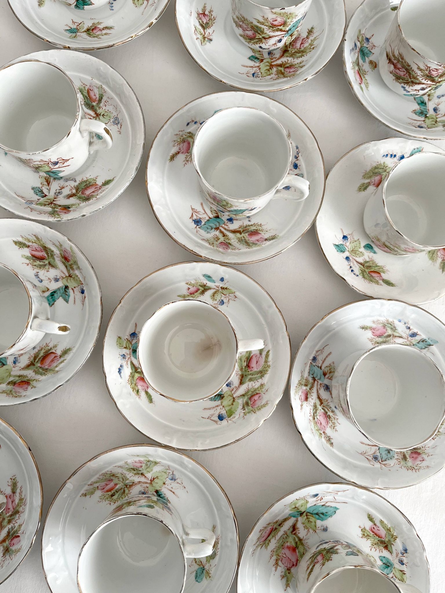 12 ironstone coffee cups with polychrome floral decoration, KG Lunéville