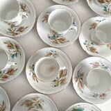 12 ironstone coffee cups with polychrome floral decoration, KG Lunéville