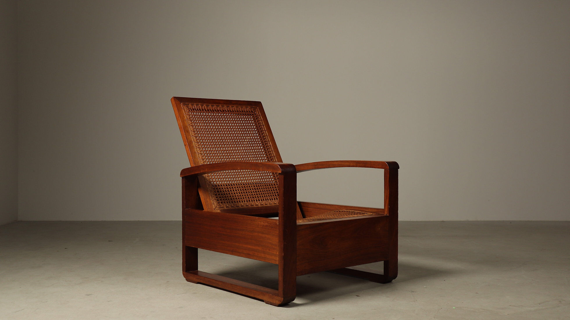 Mid-century architectural teak lounge chair with cane seat, 1950s