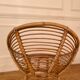 Vintage rattan spiral basket armchair
