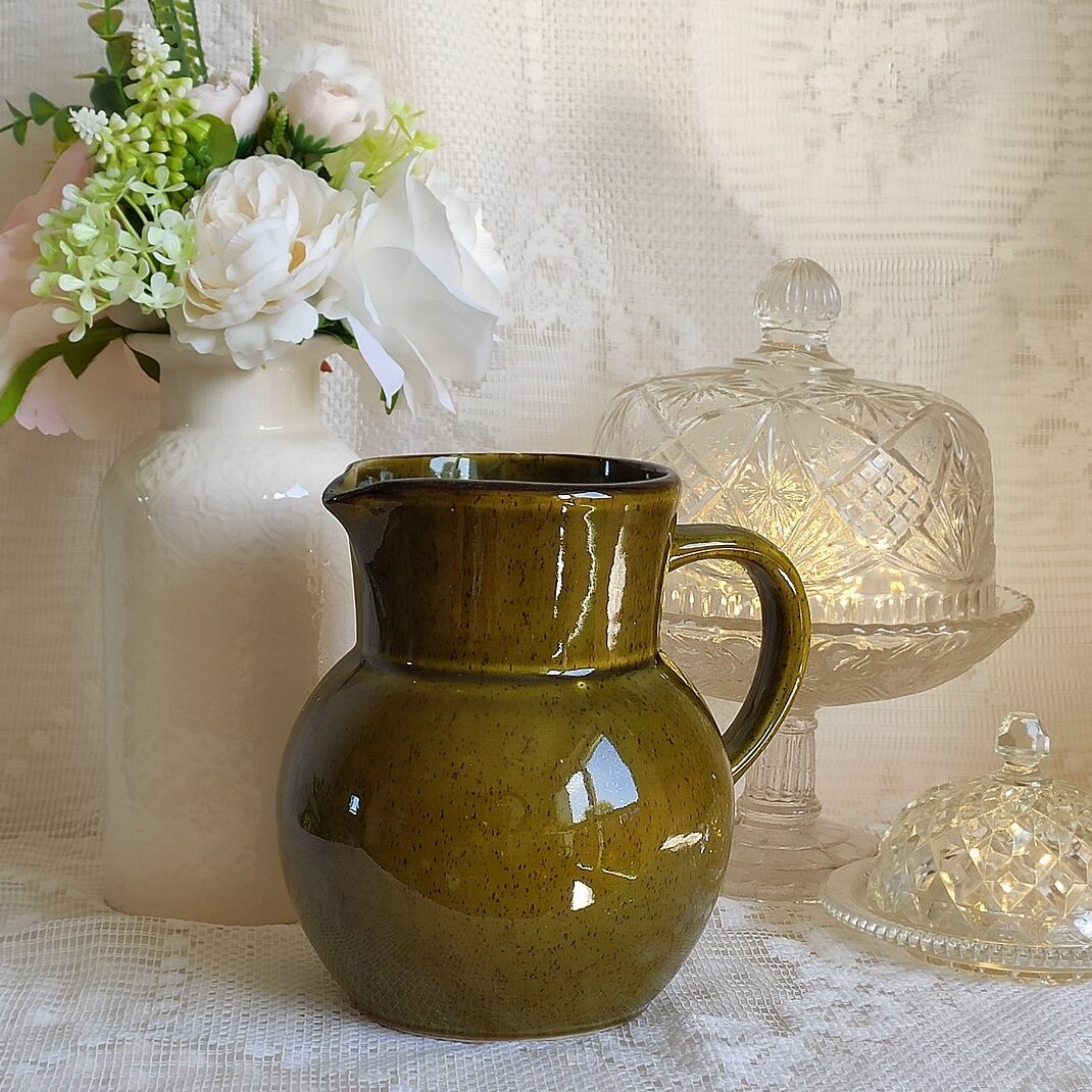 Green ceramic pitcher