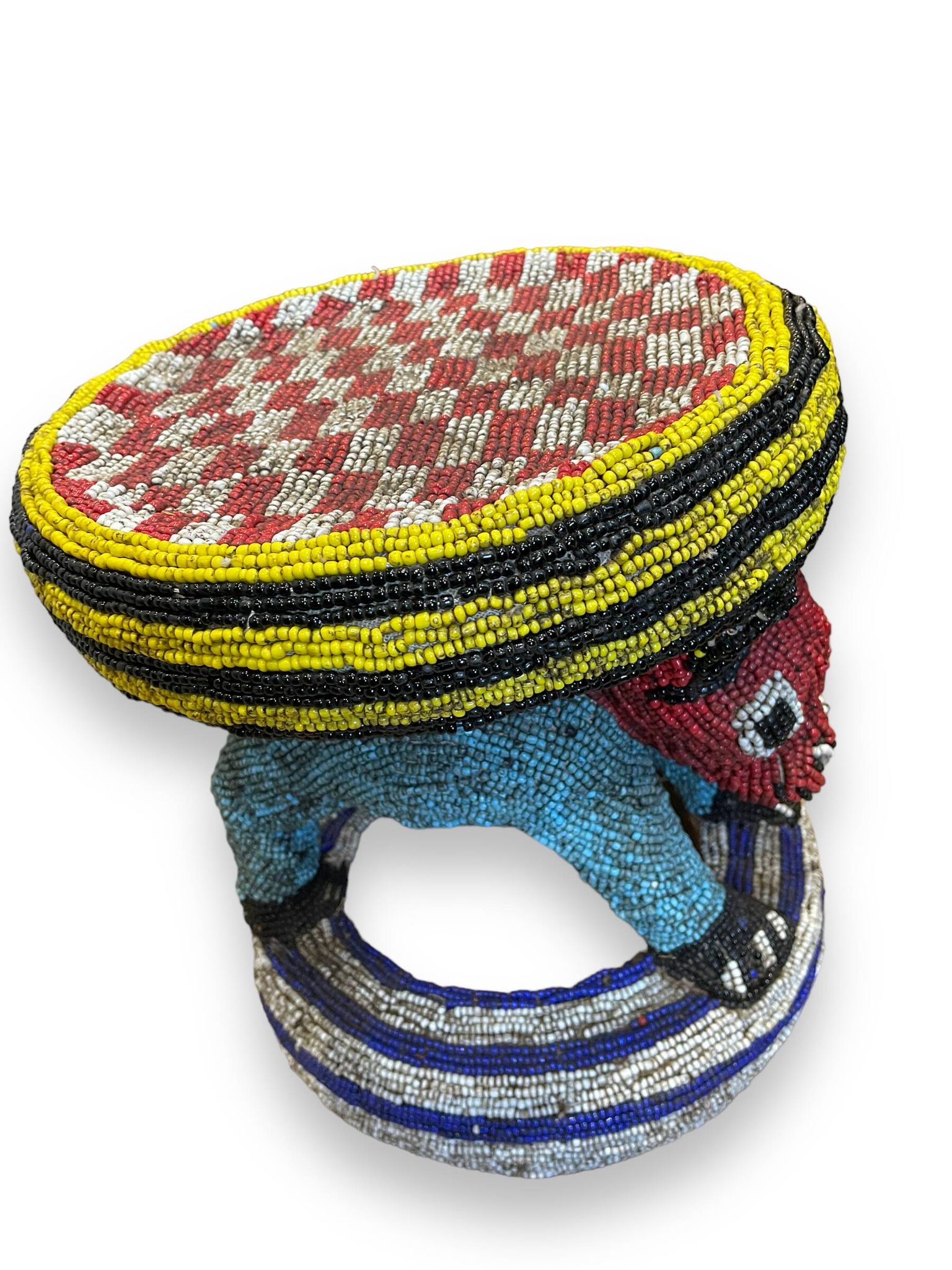 Zoomorphic beaded coffee table stool