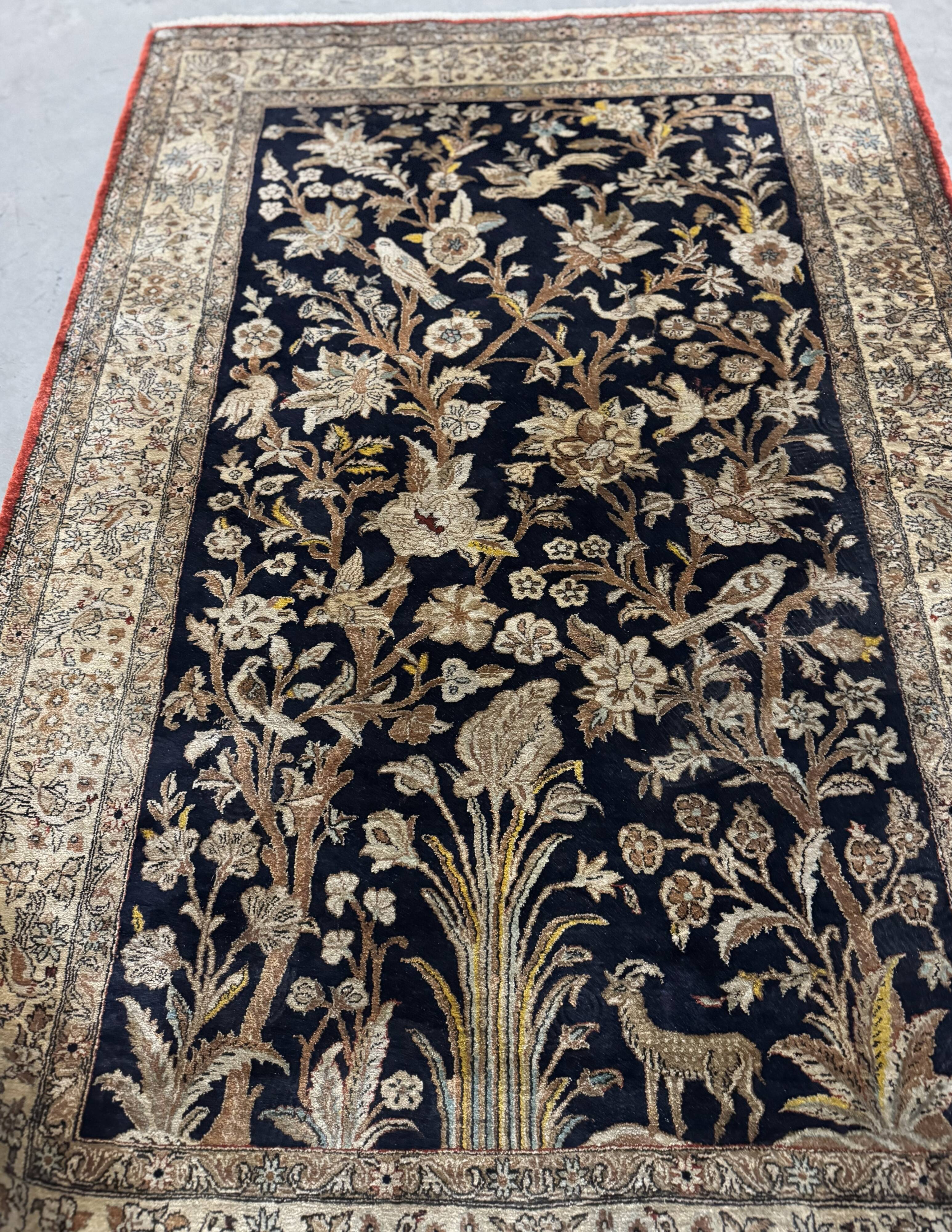 Handmade silk Persian carpet