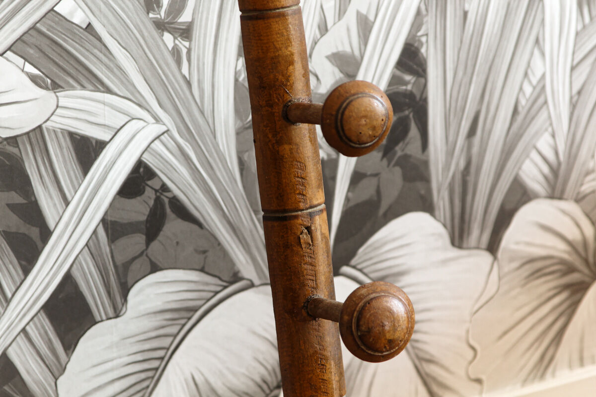 Wall mounted wooden coat rack turned