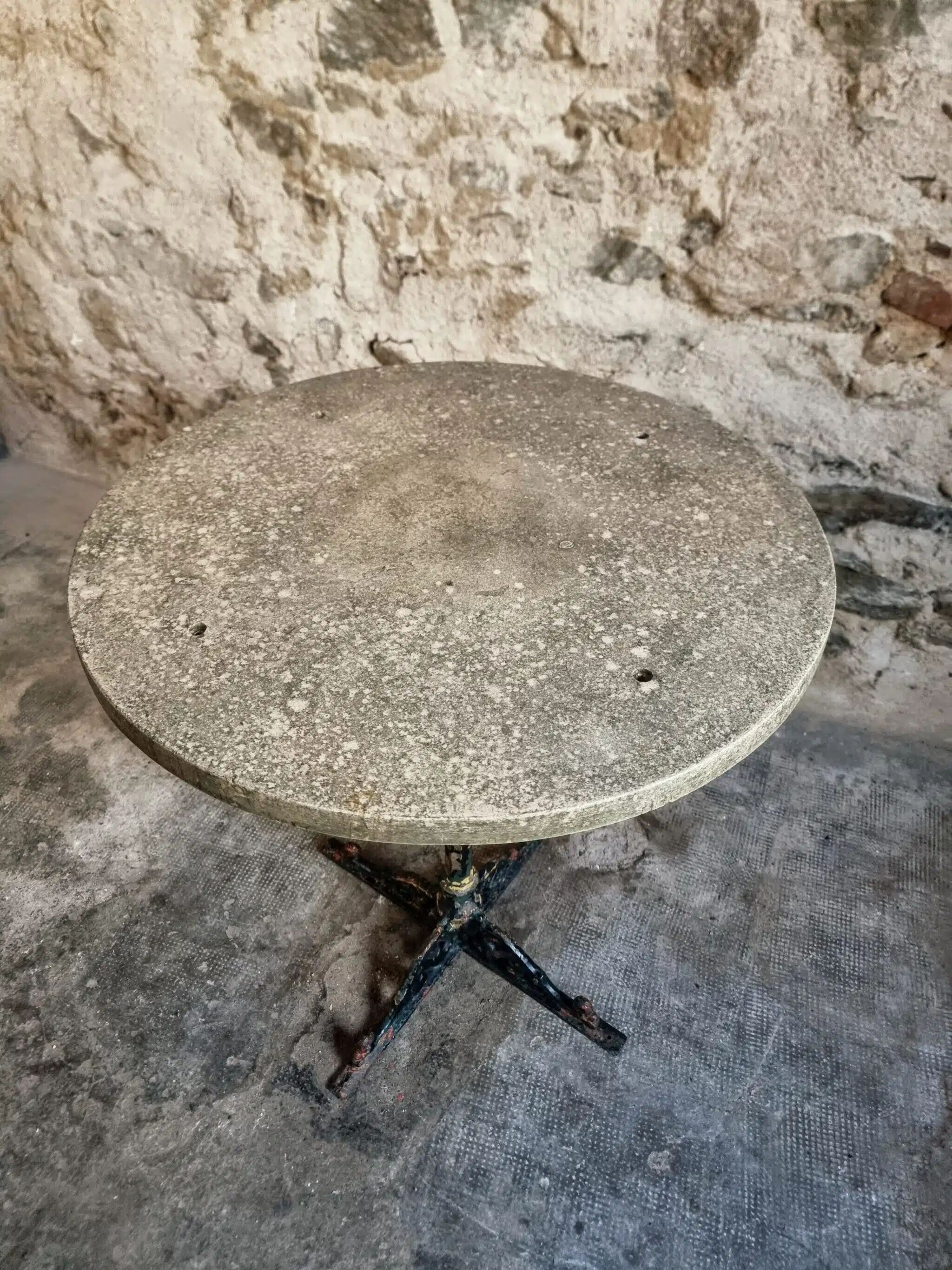 Bistro table / old garden with a cast iron base and stone top, France