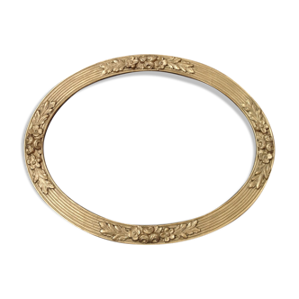 Golden oval frame
