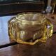Amber glass ashtray – 1960s–70s