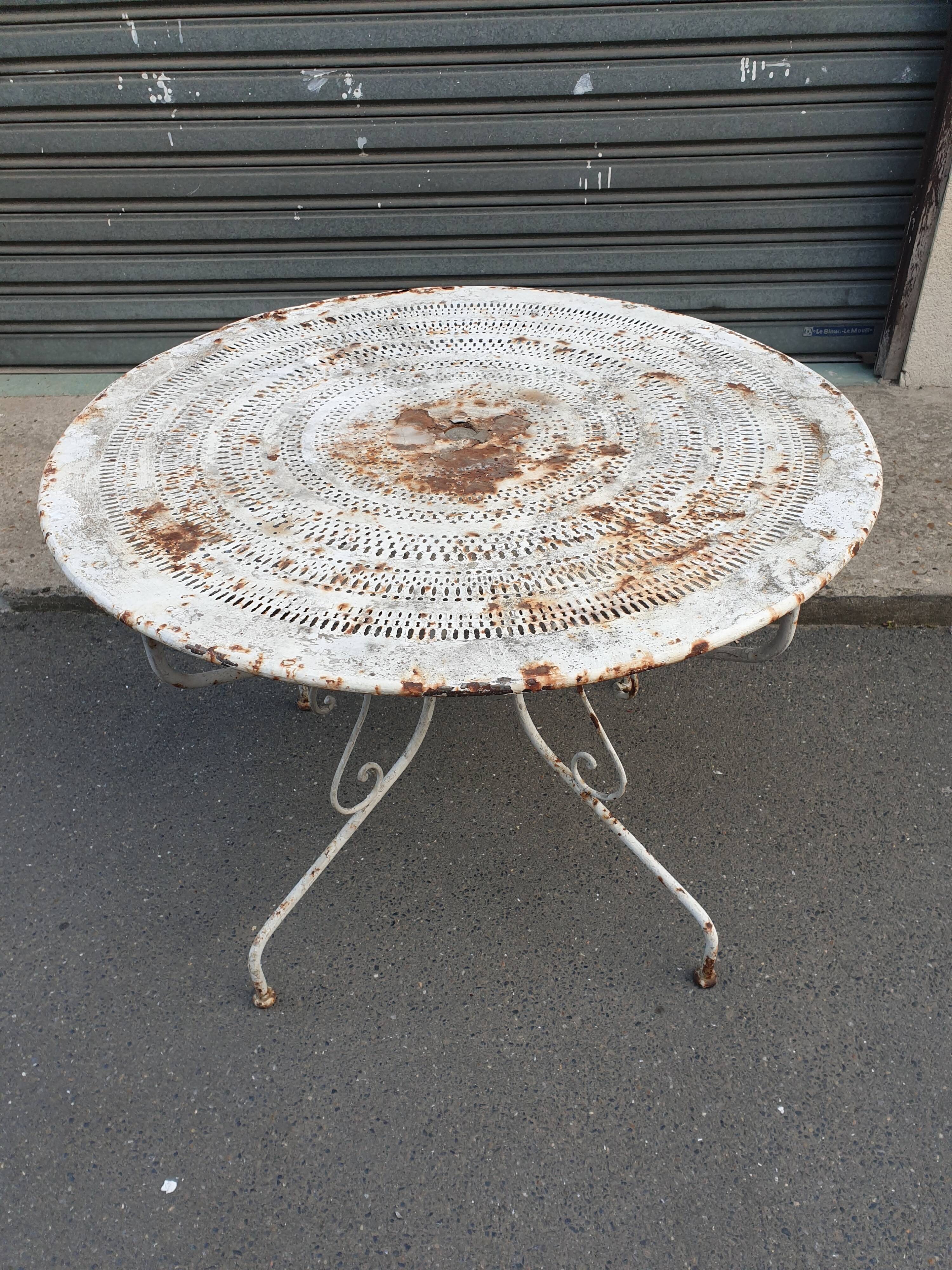 Old wrought iron garden table