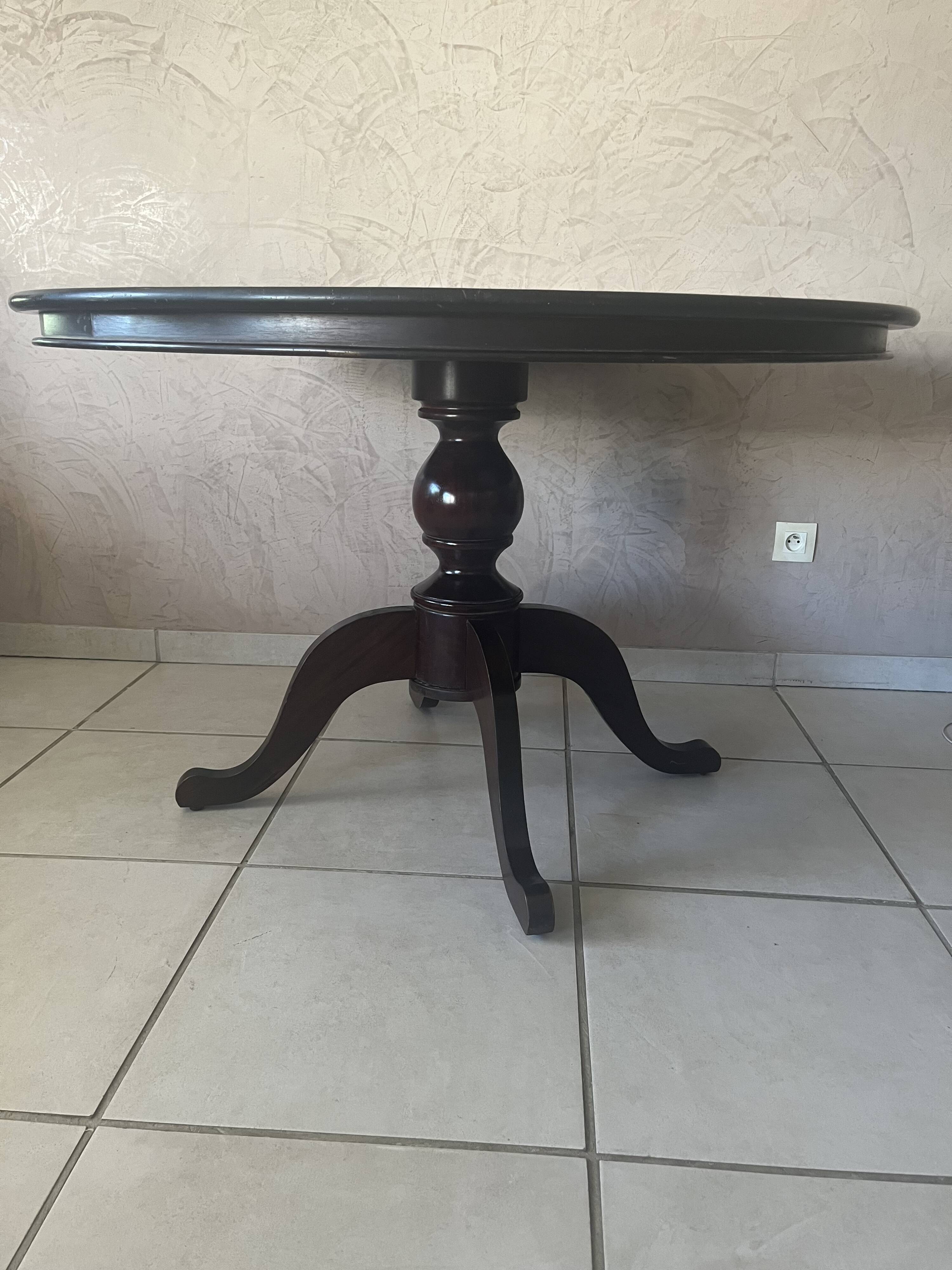 Round solid wood table