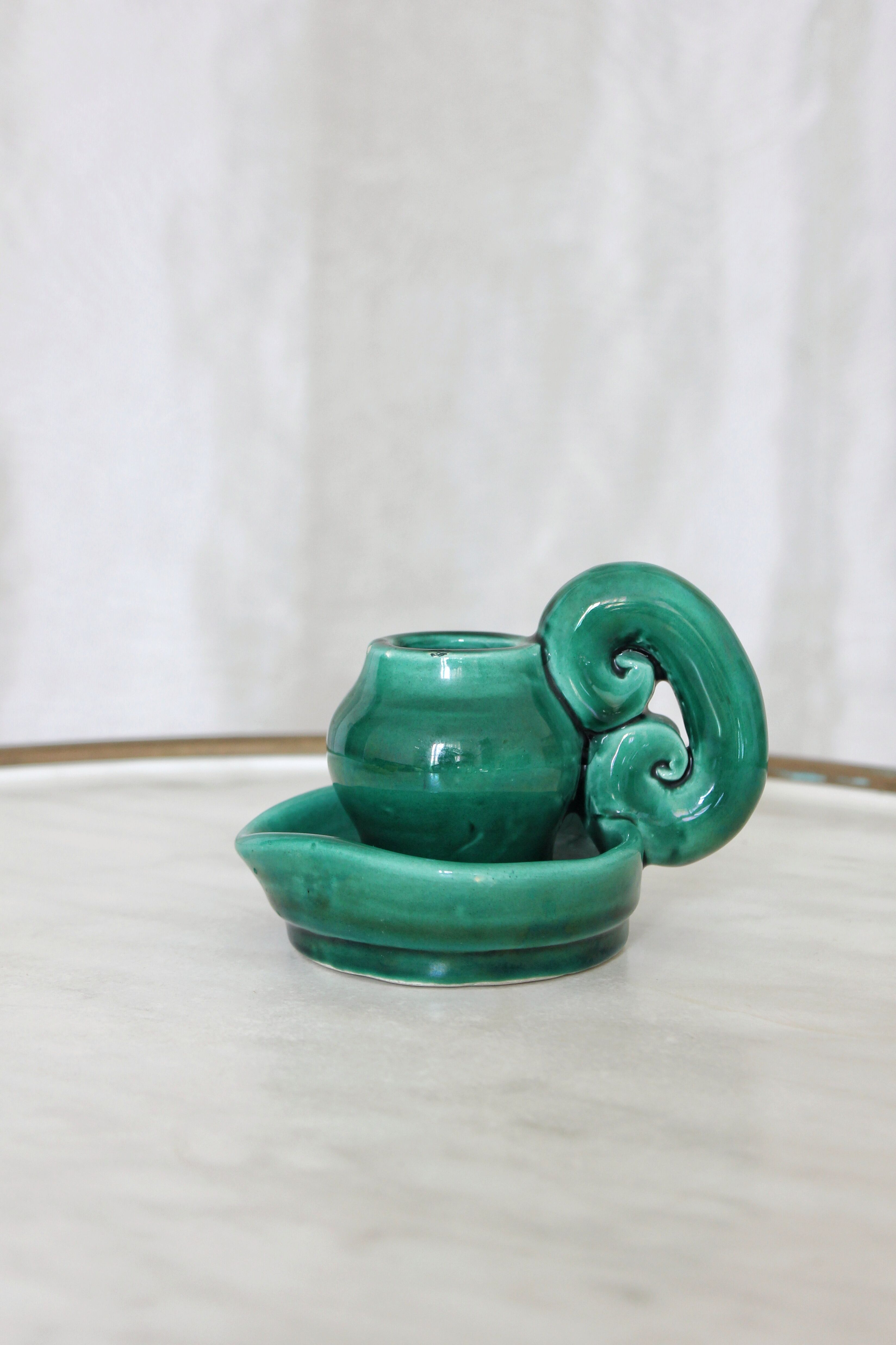 Vintage green slip ceramic candle holder