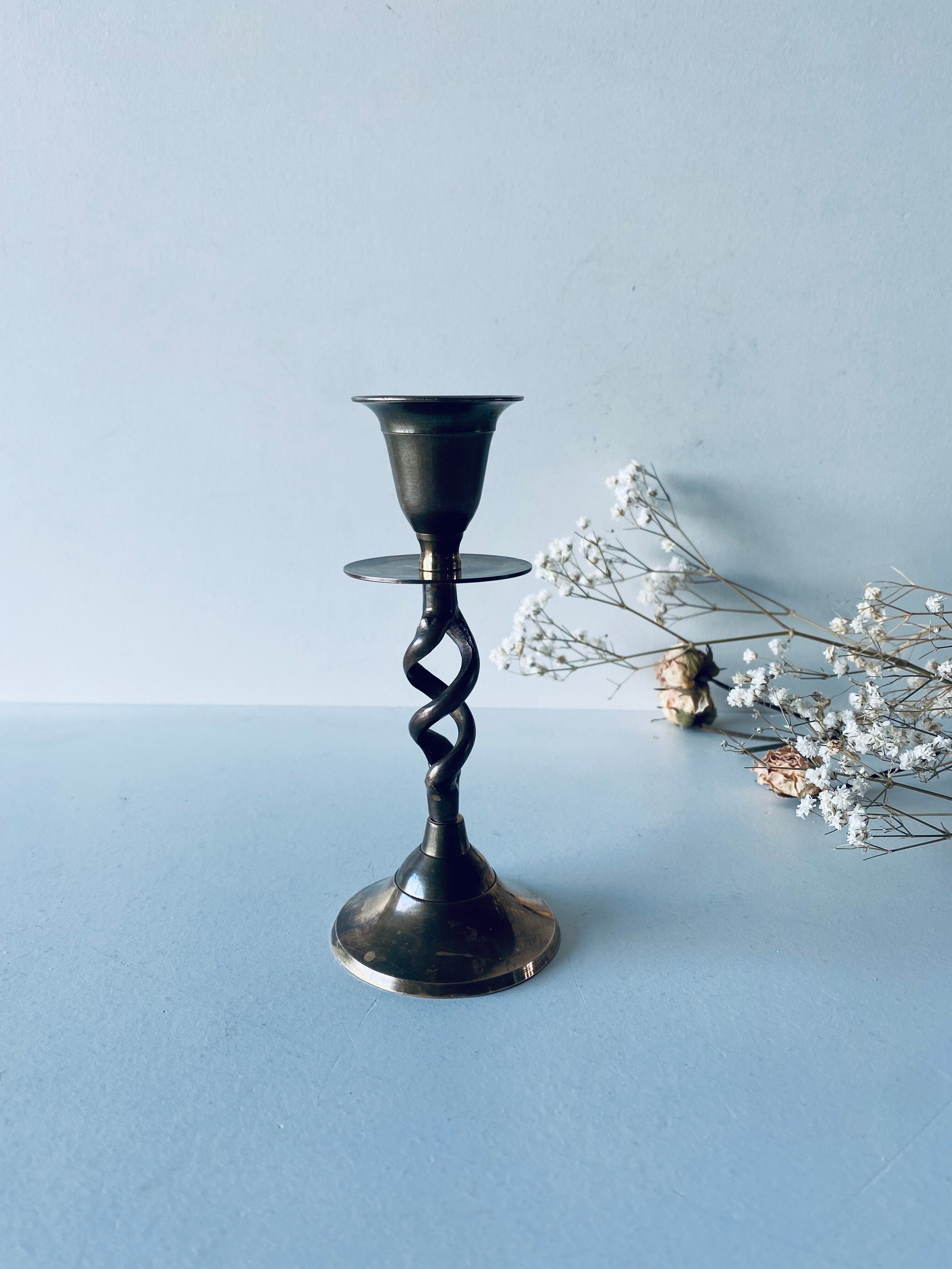Twisted brass candle holder
