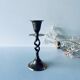 Twisted brass candle holder