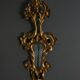 Italian mirror in gilded wood with gold leaf from the 18th century.