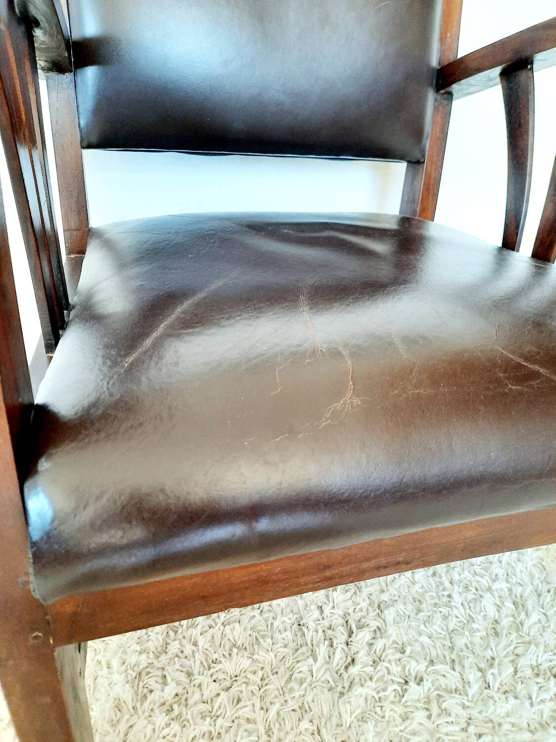 Colonial style wooden armchair