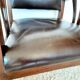 Colonial style wooden armchair