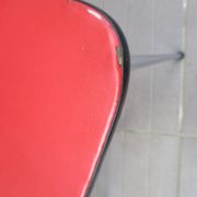 2 red chairs vintage