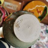 Pitcher decorated with bunches of grapes