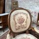 Suite de cinq fauteuils à dossier médaillon de style Louis XVI