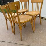 Curved varnished bistro chairs