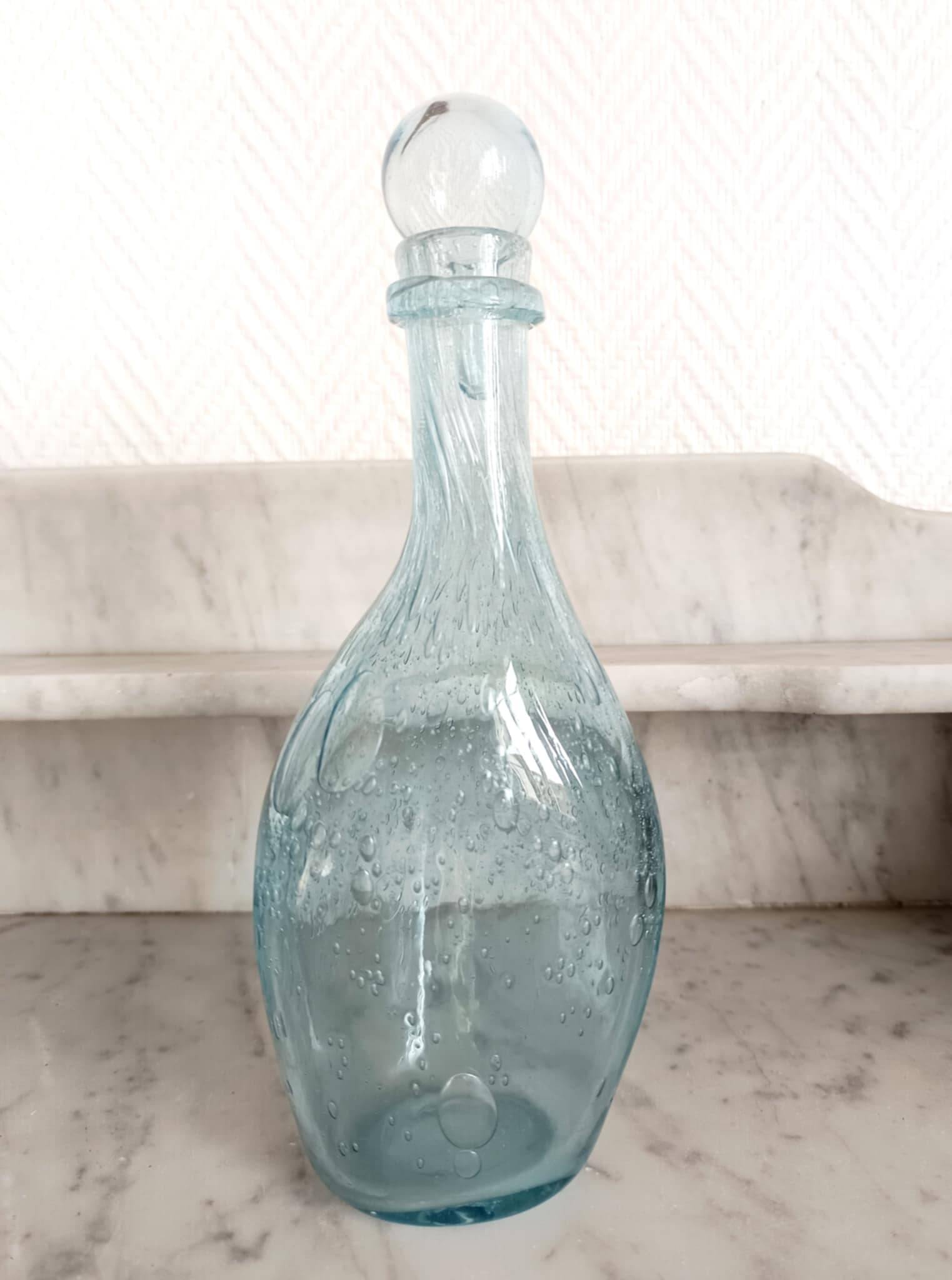 Two bubble glass carafes