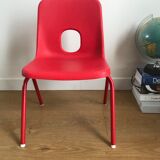 Red child chair by robin day for ikea