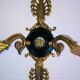 Empire bronze sconces with decorations of swans, palmettes and acanthus leaves