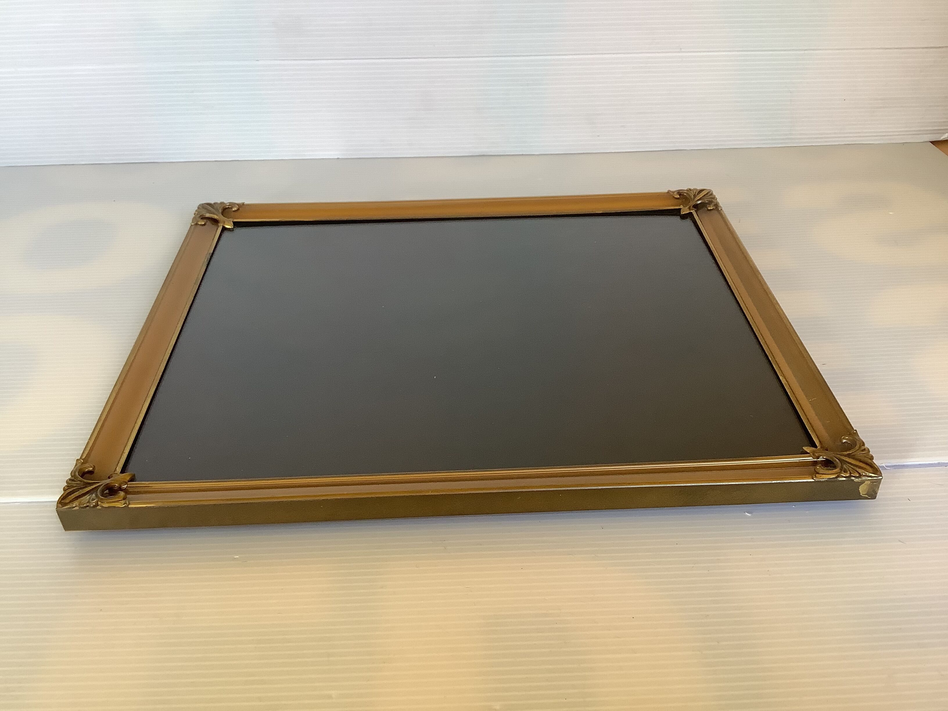 Old fleur-de-lys metal frame