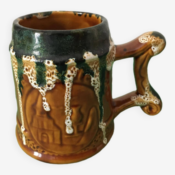 Polychrome ceramic beer mug with fat lava effect