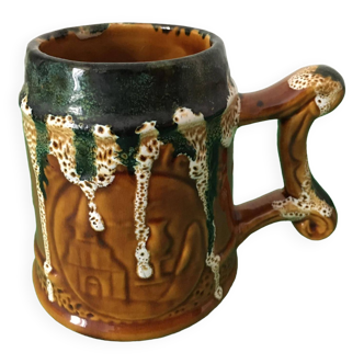 Polychrome ceramic beer mug with fat lava effect