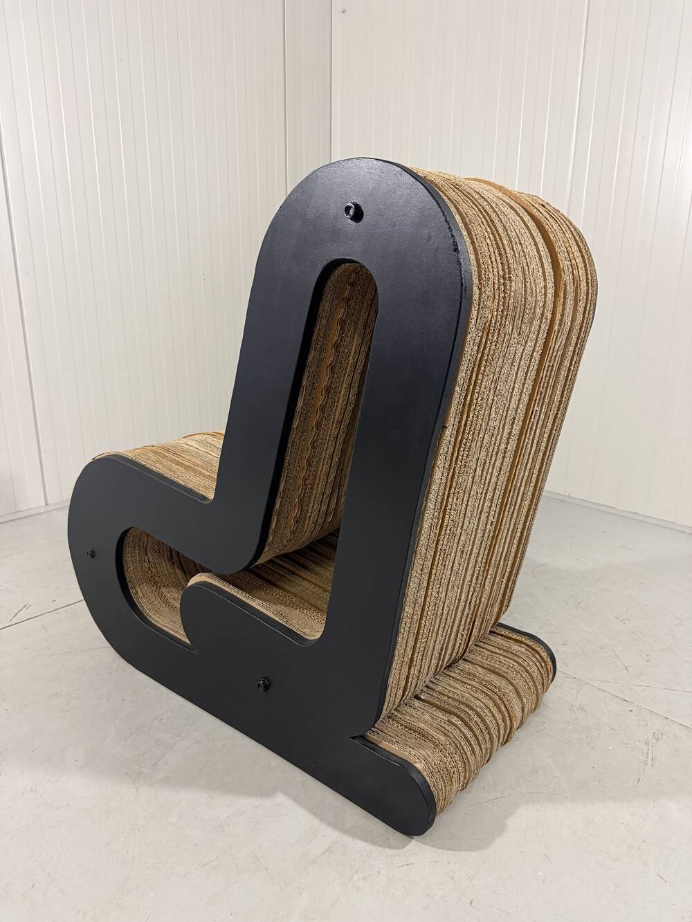 Sculpted cardboard & plywood lounge chair, 1990’s