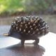 Hedgehog ensemble attributed to Walter Bosse, black patinated brass, circa 1950.
