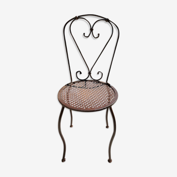 Artisanal wrought iron garden chair