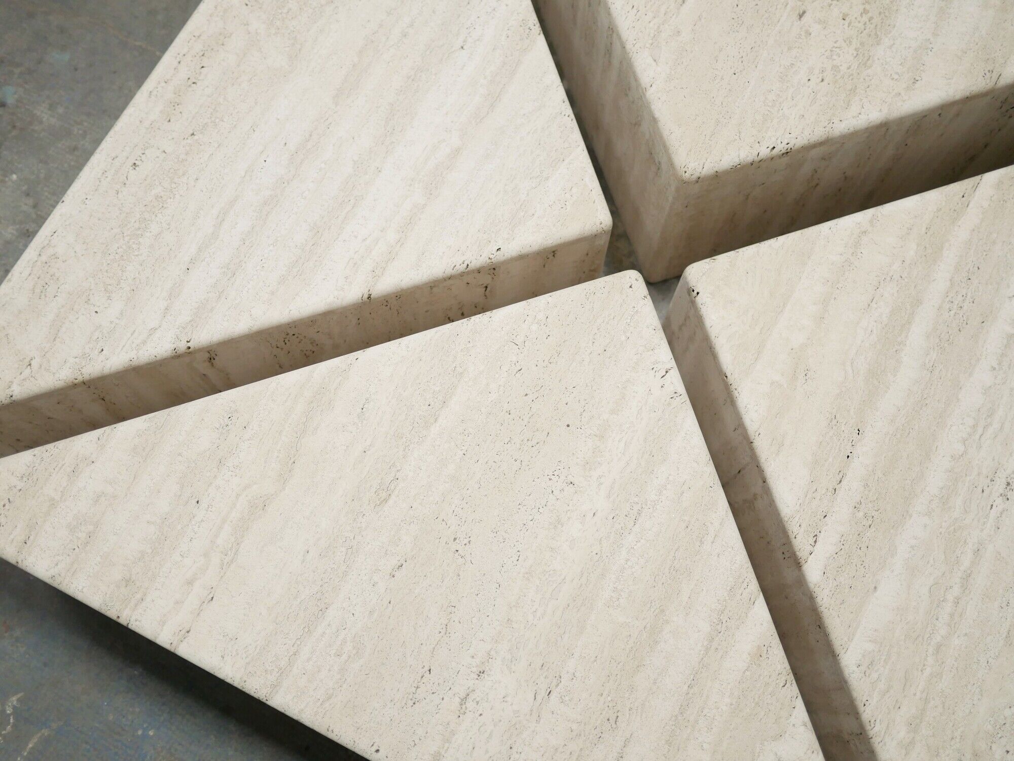 Series of 2 vintage travertine coffee tables published by Roche Bobois